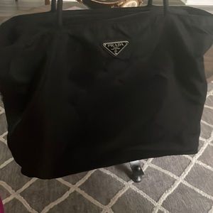 Prada shoulder bag, no damage, normal signs of wear and tear